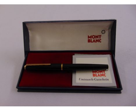 A Mont Blanc vintage fountain pen in original packaging with documents