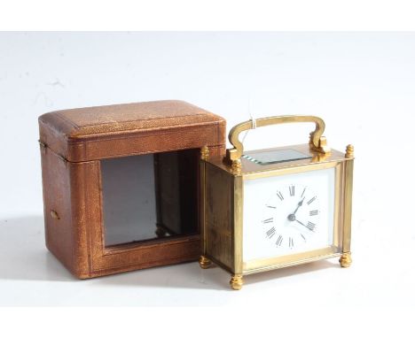 French brass carridge clock, with a white face and Roman numerals, movement stamped SFRA, with key and travelling case&nbsp;&