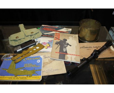 Mixed lot of items including a WW1 British 4.5" Howitzer shell case dated 1917, a WW2 brass button stick, '37 Pattern cartrid