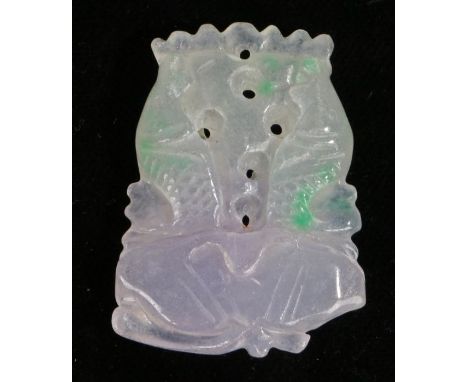 Jade pendant, carved as two leaping fish above a lotus leaf, 3.5cm wide, 5cm high