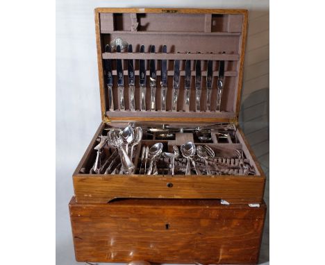 Mappin &amp; Webb, an American cased silver plated canteen of cutlery, 44cm wide x 12cm high, and three further oak canteen c