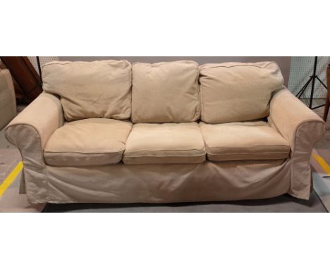 A modern hardwood framed three seater sofa on block supports, 215cm wide x 73cm high. 