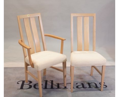 A set of eight modern stick back dining chairs, to include a pair of carvers, 58cm wide x 94cm high, (8).