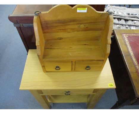 A small contemporary pine hall table with single drawer and shelf below, together with a small pine two drawer wall cupboard