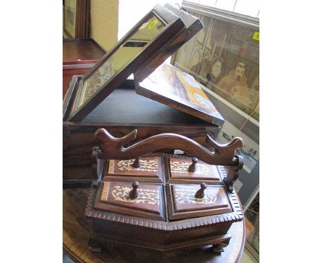 A hardwood Persian inspired table top dressing chest with folding mirror and three small drawers, together with an Italian in