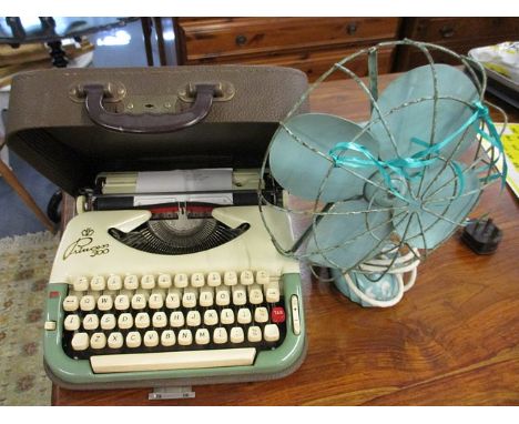 A vintage lot to include a Princess 300 typewriter and a vintage fan