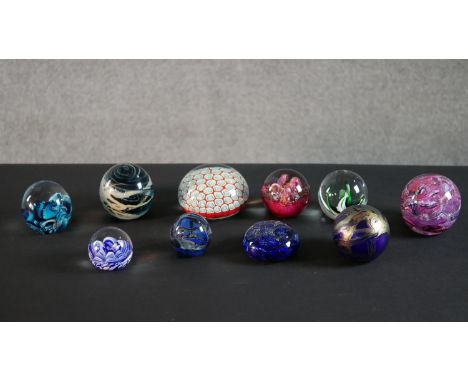 A collection of ten lamp work limited edition paperweights, various makers including Mdina and Wedgwood. H.6 Diam.11 cm (larg