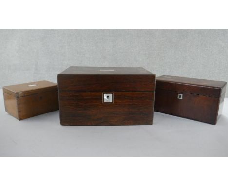 Three boxes, including a Victorian rosewood box with a mother of pearl escutcheon, a mahogany tea caddy with two compartments
