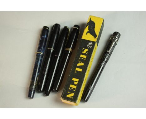 A collection of five 14 carat gold-nibbed fountain pens, including a boxed engine decorated black Seal lever filler fountain 
