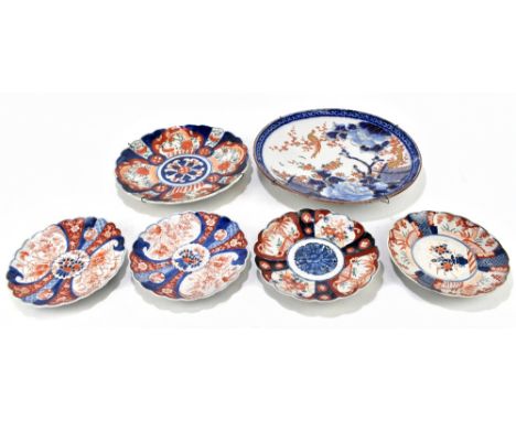 A late 19th century Japanese Imari dish, decorated with a garden scene and peonies, with gilt detailing, diameter 37cm, with 