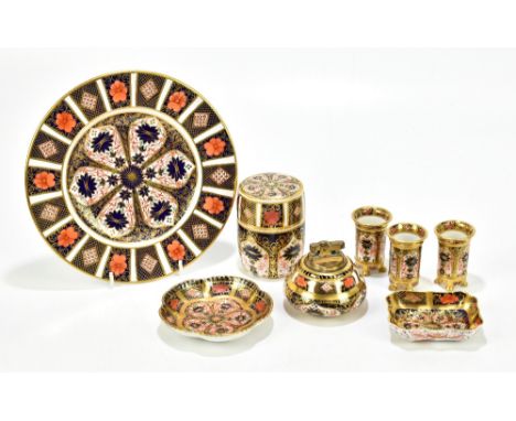 ROYAL CROWN DERBY; six pieces decorated in the 1128 pattern, comprising a cylindrical lidded pot, cabinet plate, diameter 23c