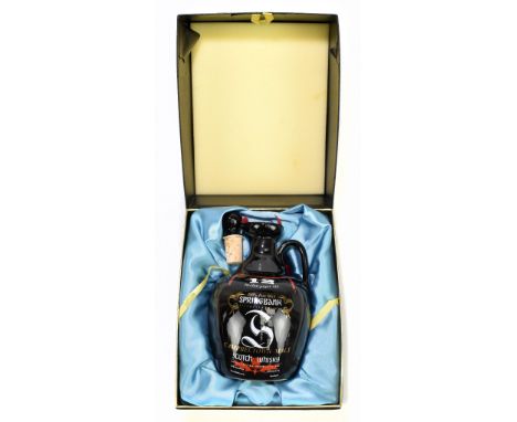 WHISKY; a single bottle of Springbank Campbeltown malt scotch whisky, 12 years old, containing in ceramic flask, boxed.&nbsp;