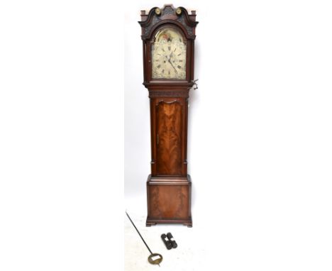 A George III mahogany longcase clock, the swan neck pediment above arched silvered dial with eight day movement set with roll