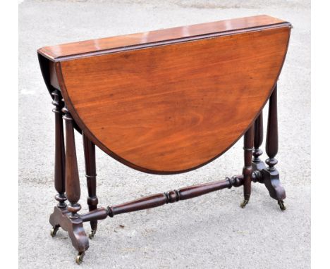 A Victorian mahogany Sutherland table, on turned column supports, height 67cm, width 88cm.Additional InformationGeneral light