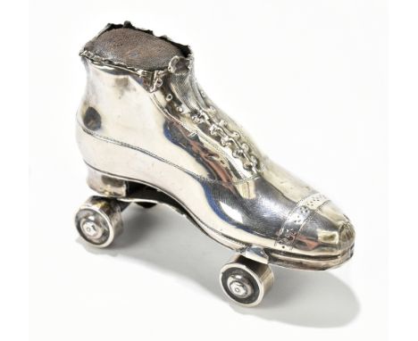 SPURRIER &amp; CO; an Edwardian hallmarked silver pin cushion modelled as a roller skate, Birmingham 1909.Additional Informat