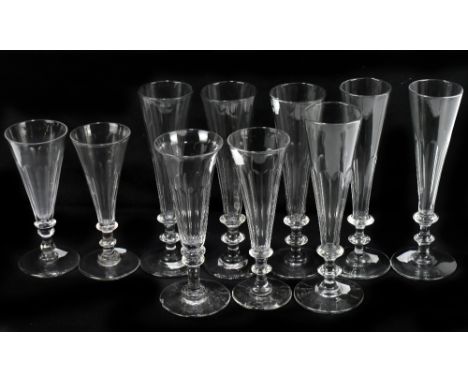 A set of six 19th century champagne flutes with faceted bodies on double knop stems, with four further champagne flutes (10).