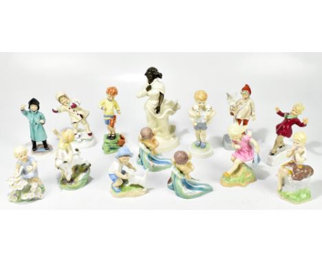 ROYAL WORCESTER; a collection of twelve 'Month of the Year' figures by F. G. Doughty, January through to December, with a Roy