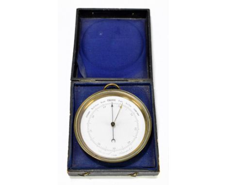 An early 20th century brass plated aneroid barometer with white dial, diameter 12cm, cased.Additional InformationMinor dents 
