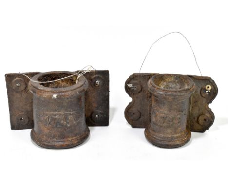 Two lead water pipe connectors, both dated 1748, height of largest 18cm.