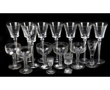 A collection of 19th century and later glasses, including five champagne saucers, a ale glass with etched detail, a set of mo