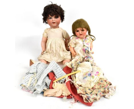 ARMAND MARSEILLE; two bisque head dolls, comprising a 996 doll with sleeping eyes, open mouth and sprung tongue, with jointed