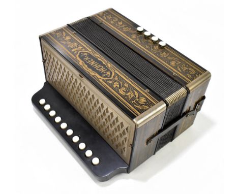 HOHNER; a ten button German squeeze box.