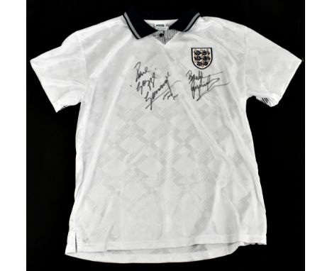 ENGLAND: a 1990 retro style shirt, signed by Paul Gascoigne and Gary Lineker, size XL.Additional InformationCreasing and ligh