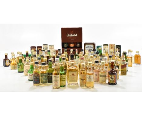 A collection of assorted miniatures, the majority being Scotch whisky, various brands including Glenfiddich, Laphroaig, etc.