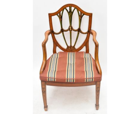 An Edwardian painted satinwood Hepplewhite Revival elbow chair, the painted decorated back with a central portrait flanked by