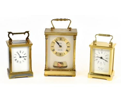 A brass cased carriage clock and two battery operated examples, largest 15cm (3).