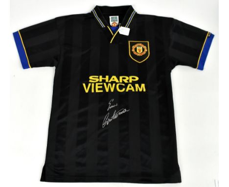 ERIC CANTONA; a Manchester United 'Kung Fu Kick' shirt, signed to the front, size S.Additional InformationCreasing and light 