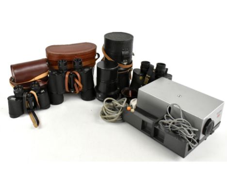 A Russian Roct 5.26-69 lens, cased, together with a pair of Karl Zeiss Jena 8x30w binoculars, two further pairs of binoculars