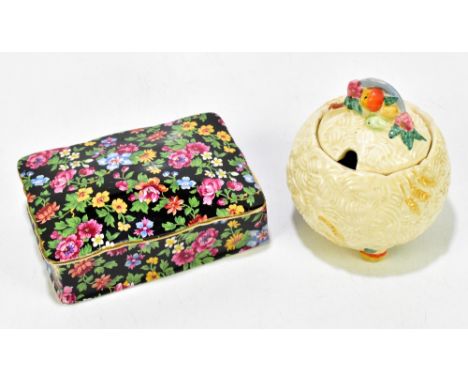 CLARICE CLIFF; a Newport Pottery 'Celtic Harvest' preserve pot and cover, and a Royal Winton chintz rectangular box and cover