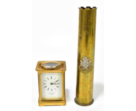 An early 20th century brass cased carriage clock with white enamel dial inscribed 'Camerer Kuss &amp; Co.', height 11.5cm, al