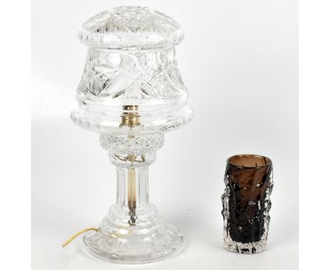 A cut glass lamp, and a Whitefriars cinnamon bark vase.