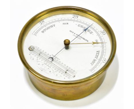 ADIE &amp; WEDDERBURN OF EDINBURGH; a brass plated wall hanging aneroid barometer, diameter 12cm.&nbsp;Additional Information