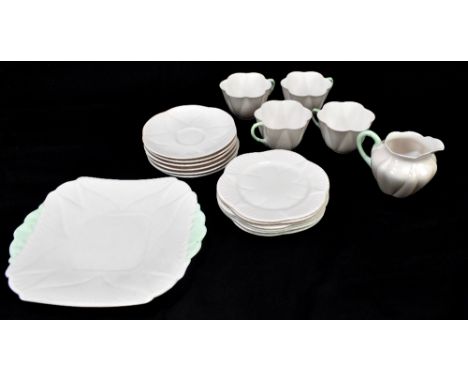 SHELLEY; a 'Dainty' pattern eighteen piece part tea service, in white with pale green handles, comprising sandwich plate, six
