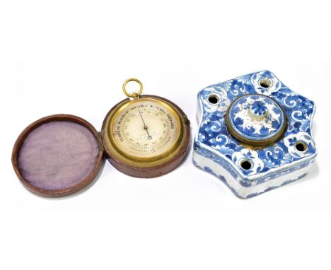 PERTUIS, HULOT &amp; NAUDET BAROMETRES; a late 19th century lacquered brass pocket barometer, diameter 6cm, in leather case, 