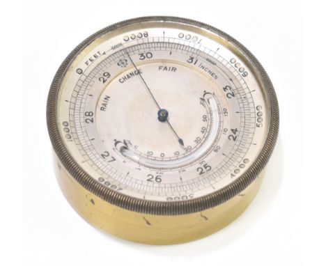 An early 20th century gilt metal cased aneroid pocket barometer with silvered dial, diameter 5.5cm, cased.Additional Informat