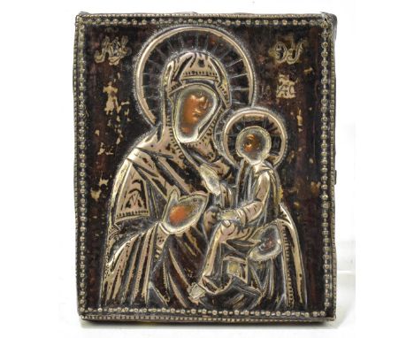 18TH/19TH CENTURY RUSSIAN SCHOOL; oil on panel, icon with a silver oclad, with city mark, possibly St. Petersburg, maker's in