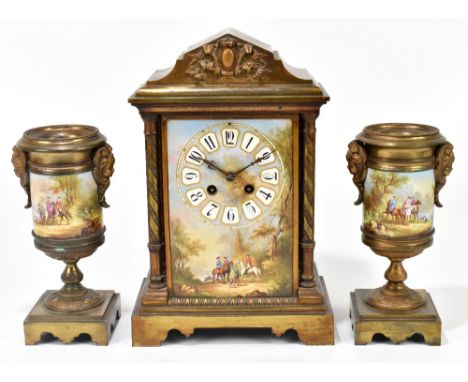 A late 19th century gilt metal and enamel painted clock garniture, the clock with rectangular dial set with Arabic numerals, 