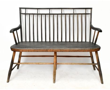 COHASSET COLONIAL HAGERTY; an early to mid 20th century primitive style Sussex type beech and ash country bench, with solid s