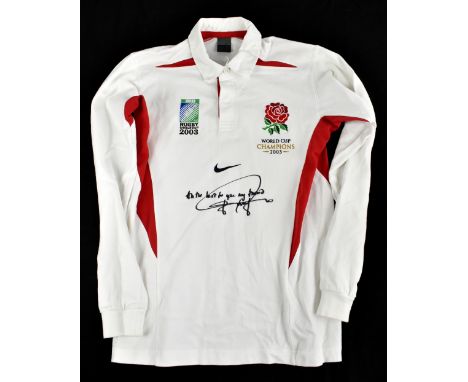 JONNY WILKINSON; a 2003 World Cup winners' rugby embroidered shirt, signed to the front, size M.Additional InformationCreasin