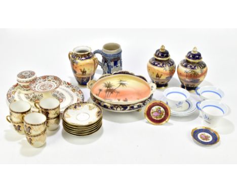 An assortment of 19th century and later ceramics including a Noritake twin-handled vase decorated with a desert scene, togeth