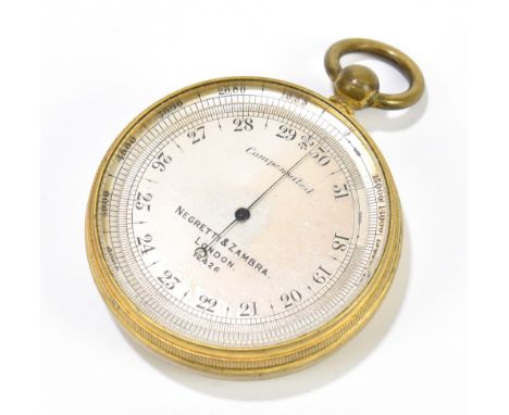 NEGRETTI &amp; ZAMBRA; an early 20th century gilt metal cased pocket aneroid barometer, the silvered dial no.12426, diameter 