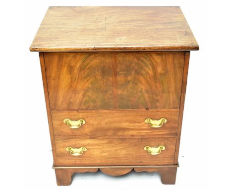 A 19th century mahogany commode, with hinged top and two dummy drawers on bracket feet, height 69cm, width 60cm, depth 44cm.