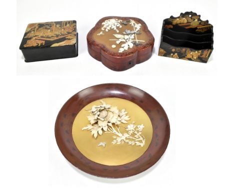 A late 19th century Cantonese lacquered papier mache rectangular box, the lid decorated with a scene of figures in an interio