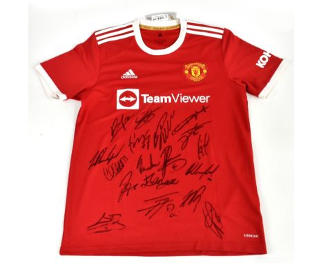 MANCHESTER UNITED; a 2021/22 home shirt, signed by B. Fernandez, Telles, Ronaldo, Maguire, Fred, Rashford, Dalot, Lindloff, J