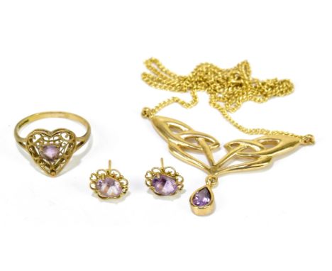A yellow metal pendant stamped 9K in the Art Nouveau style set with an Amethyst drop, on a 9ct yellow gold chain, together wi