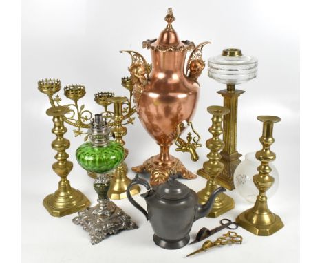 A 19th century copper samovar, the twin handles modelled as maidens' busts wearing helmets, height 56cm, with two pairs of br